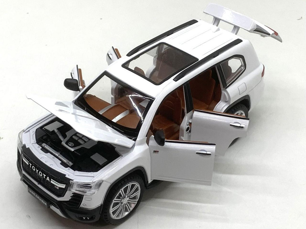 Машина Автосвіт Toyota Land Cruiser інерційна відчиняються двері капот багажник 20 см 1:24 Біла (AP-2034) Чернігів - фото 6