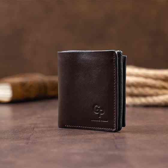 Вертикальне глянсове портмоне з накладною монетницьою GRANDE PELLE 11330 Шоколадне Київ