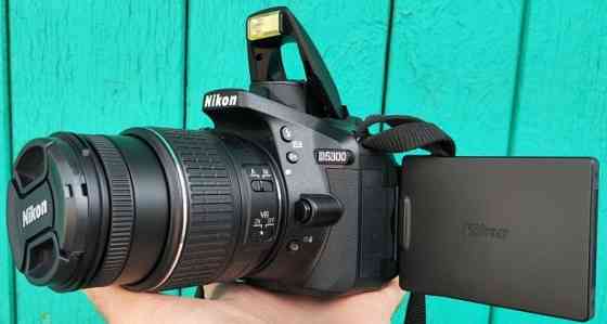 Дзеркальний фотоапарат
Зі знімним об'єктивом
Nikon D5200+18-55 VR ll Київ