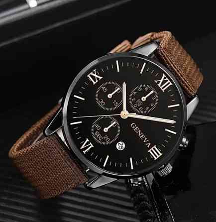 Подарочный набор для мужчин: наручные часы с 3 ориг. браслетами- диам 4см, длин 24см, шир рем 2см, без коробки Киев