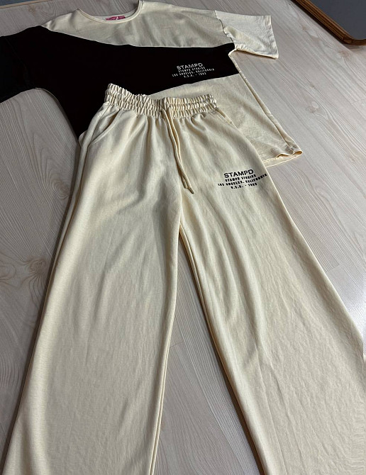 Костюм женский CAPPITONE 3162 оверсайз с черной вставкой футболка и брюки палаццо бежевый, бежевый, S Киев - изображение 17