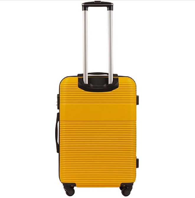 Валіза пластикова Wings 5398 середня 65 см жовта Київ - фото 3