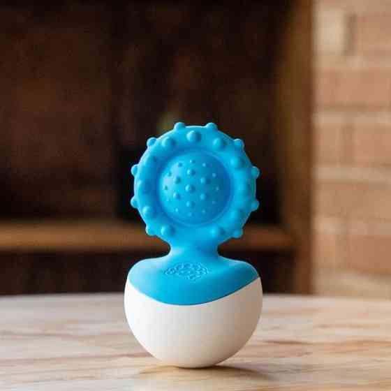 Прорізувач-неваляшка Fat Brain Toys dimpl wobl блакитний (FA217-4) Харків