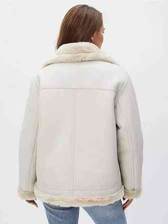 Жіноча стильна молочна дублянка зі штучним хутром M Одеса