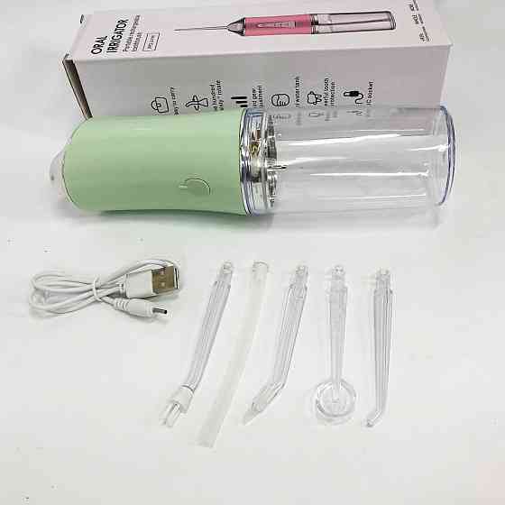 Ирригатор для чистки зубов и полости рта Oral Irrigator с аккумулятором и сменными насадками. Цвет: зеленый IH-24 Львов