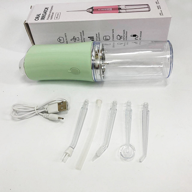 Ирригатор для чистки зубов и полости рта Oral Irrigator с аккумулятором и сменными насадками. Цвет: зеленый IH-24 Львов - изображение 1
