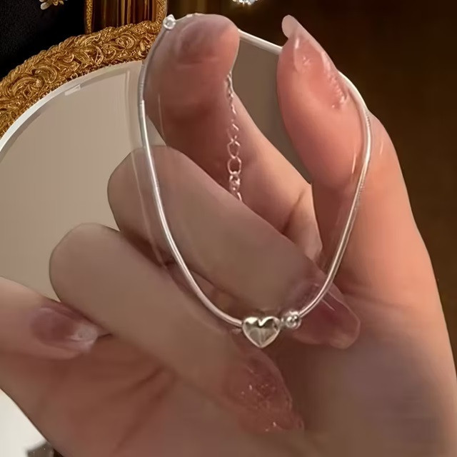 Женский браслет с серебристой подвеской-сердцем – минималистичный браслет из нержавеющей стали Киев - изображение 7