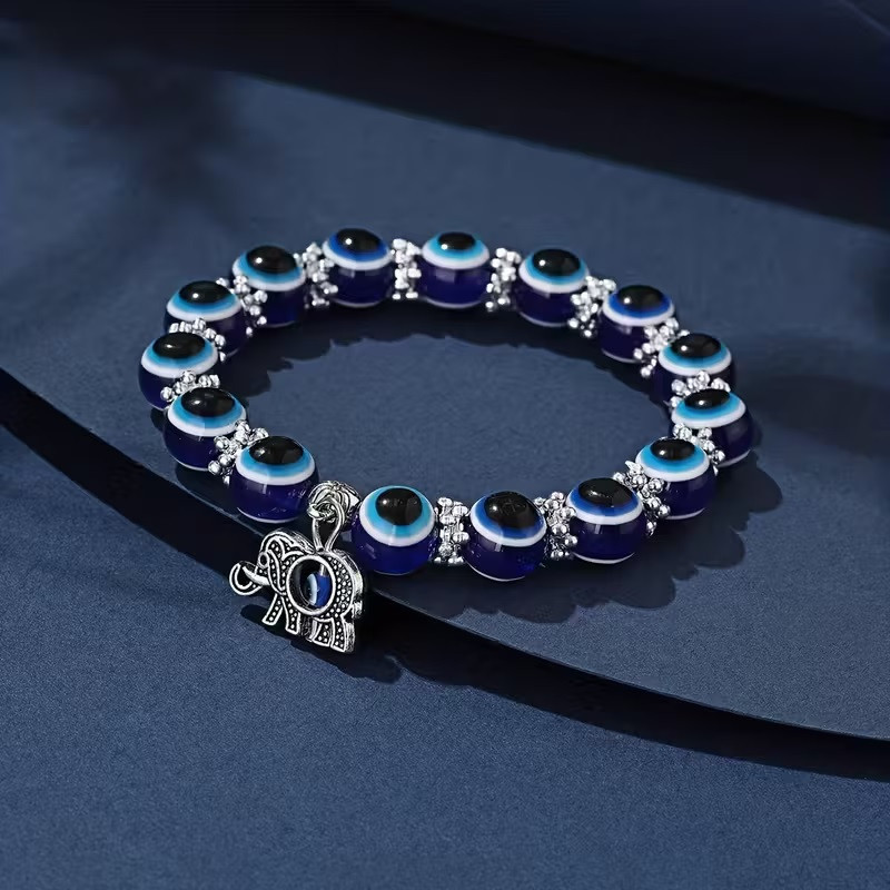 Браслет-оберіг від злого ока з намистинами та підвіскою слон Київ - фото 1