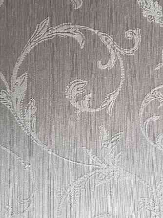 Шпалери текстильні 0.53х10.05 Rasch Textil Valentina класика завитки вензелі структурні біло сіре на сірому Київ