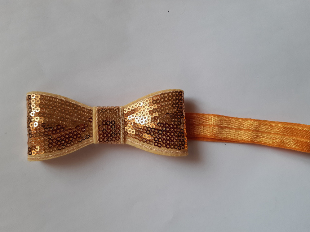 Пов'язка дитяча світло-оранжева з паєтками - бант близько 10см, окружність 36-48см Київ - фото 1