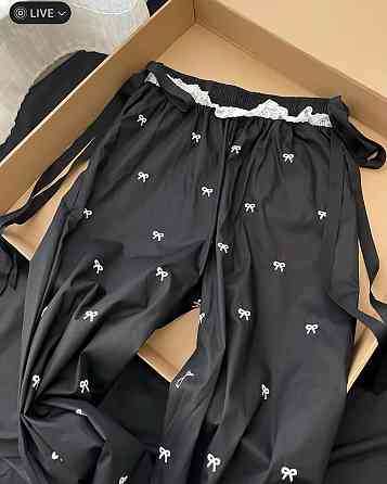 Женские стильные оверсайз брюки карго с бантиками отделаны кружевом плащевка Черный Одесса