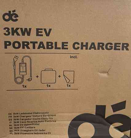 Зарядное устройство на электро автомобиле. Киев