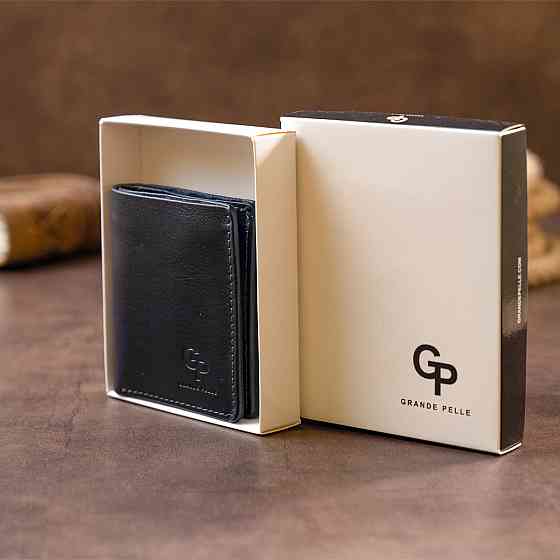 Вертикальне глянсове портмоне з накладною монетницьою GRANDE PELLE 11332 Синє Київ