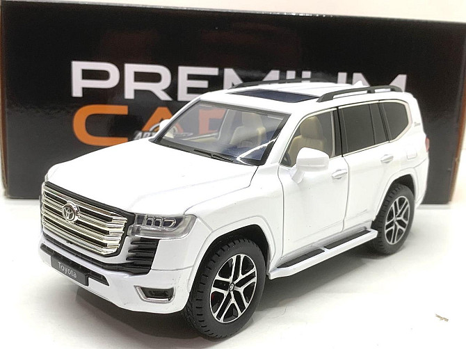 Машина Автосвіт Toyota Land Cruiser 300 інерційна відчиняються двері капот багажник 20 см Біла (AP-2007) Чернігів - фото 1