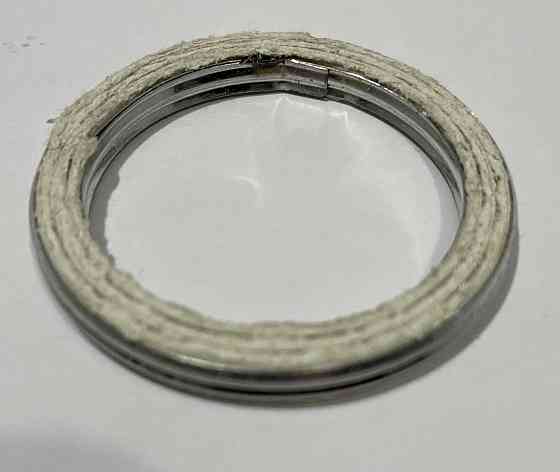 Прокладка коліна глушника МІНСК (метало-азбестова) Мукачево