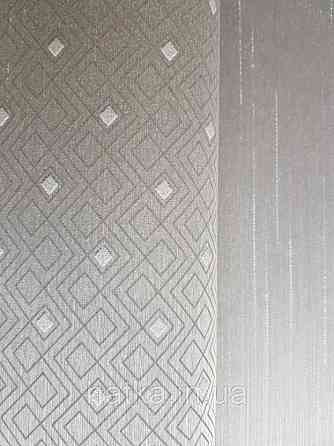 Текстильні шпалери на флізеліновій основі Cador Rasch Textil 086613 сіро-бежевий ромби геометрія абстракція Київ