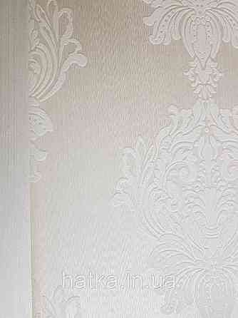 Текстильні шпалери на флізеліновій основі Cador Rasch Textil 086804 вензелі білі Київ