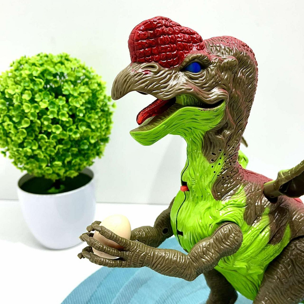 Динозавр відкладає яйця рухає лапами зі світловими та звуковими ефектами (878A) Чернігів - фото 9