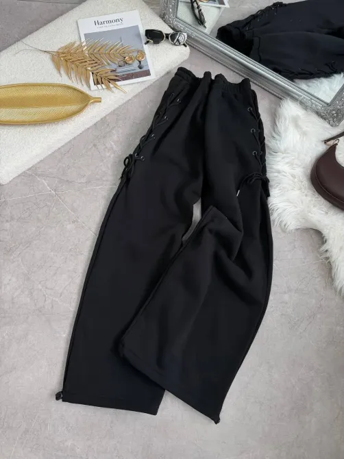 Теплые женские спортивные штаны оверсайз на флисе со шнуровкой по бокам снизу на затяжках Харьков - изображение 4