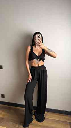 Жіноча піжама-двійка: топ і штани з романтичними рюшами рубчик Чорний Одеса