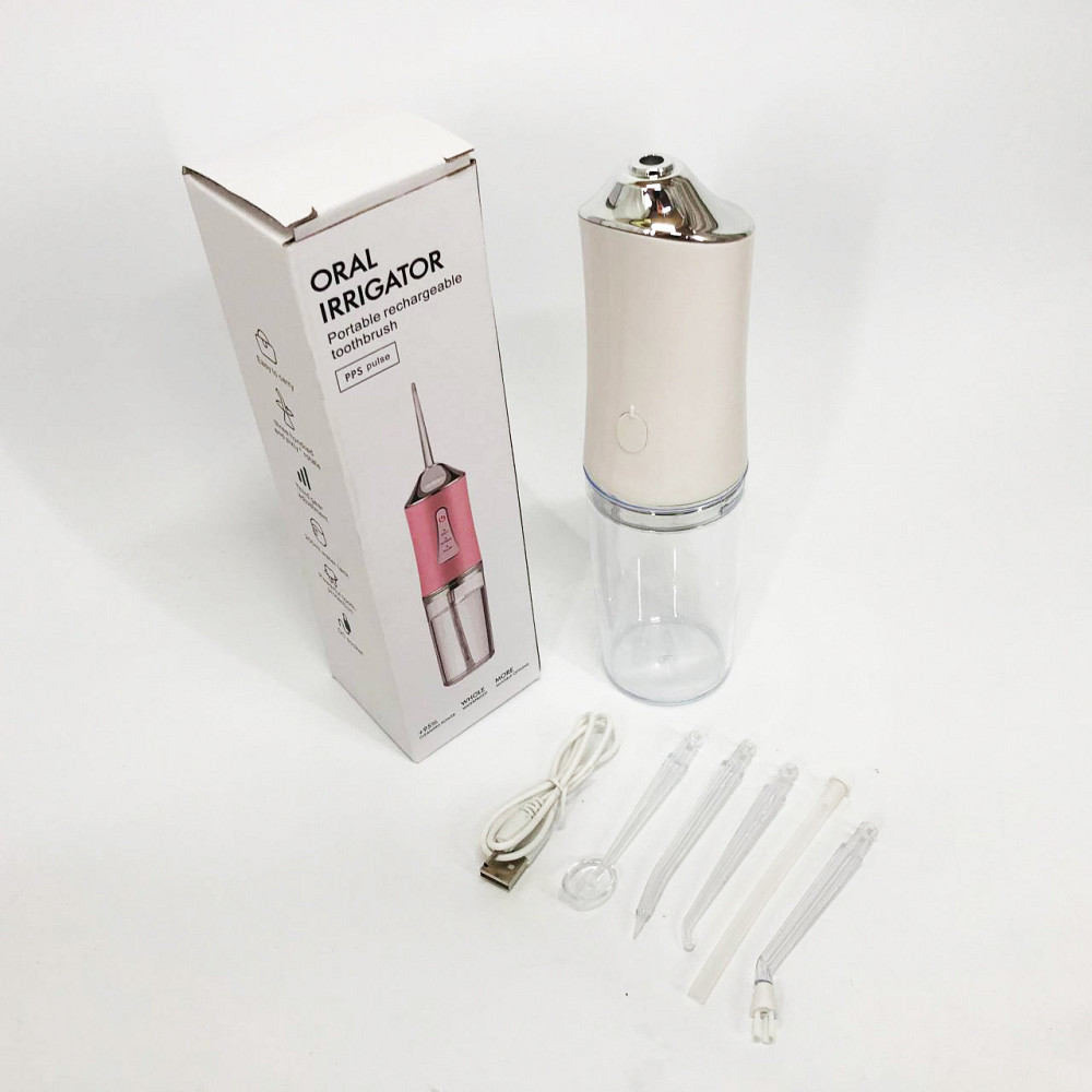 Ирригатор для чистки зубов и полости рта Oral Irrigator с аккумулятором и сменными насадками. Цвет: белый HK-42 Львов - изображение 7