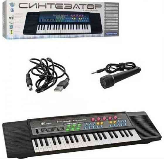 Синтезатор (новый) с микрофоном. Харьков