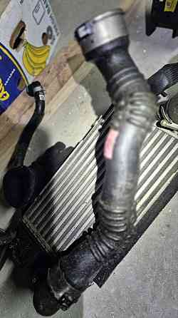 Патрубок интеркулера нижний Hyundai Tucson 22-26 1.6T HEV 282602M410 Арт 832426. Київ