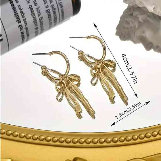 Сережки з бантиком золотого кольору – витончені підвісні Київ