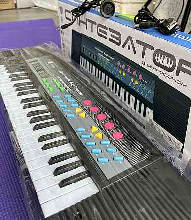 Синтезатор (новый) с микрофоном. Харьков