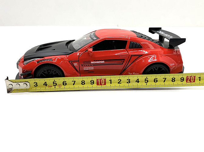 Машинка металева Авто Експерт Nissan Gtr 1:24 світло/звук Червона (GT-1502) Чернігів - фото 10
