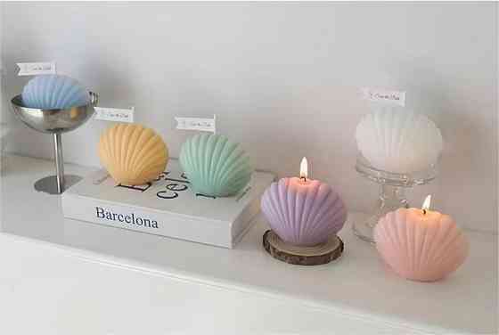 Свеча “Морская ракушка” ручной работы фиолетового цвета Каменец-Подольский