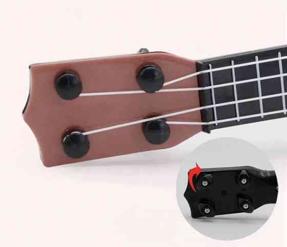 Гітара дитяча іграшка, коричнева, дитяча укулеле, довжина - 25см, ширина 9см, пластик, 4 струни, унісекс, 3+ Київ