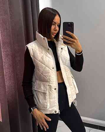 Женская стеганая жилетка плащевка лак на синтепоне Молочный, 42 Одесса