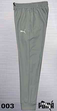 Чоловічі завужені штани під манжет Puma, тканина лакоста new Tech knit Київ