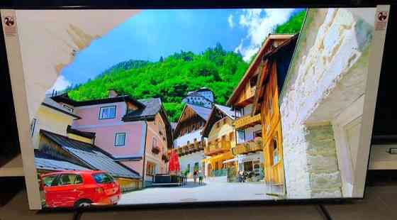 Телевизор Безрамный: 65