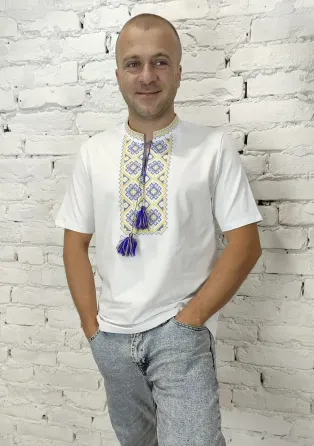 Чоловіча вишиванка в білому кольорі з жовто блакитним орнаментом Київ