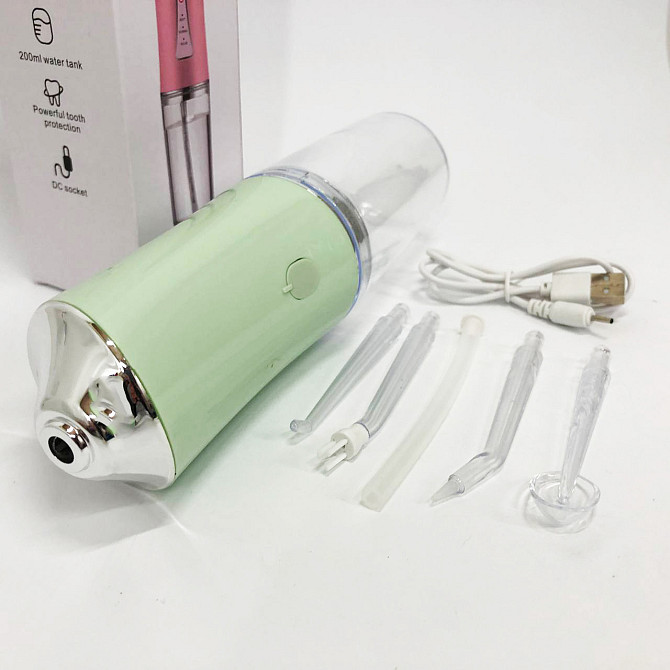 Ирригатор для чистки зубов и полости рта Oral Irrigator с аккумулятором и сменными насадками. Цвет: зеленый IH-24 Львов - изображение 3
