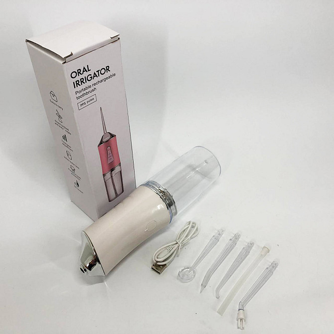 Іригатор для чищення зубів та порожнини рота Oral Irrigator з акумулятором та змінними насадками. BC-907 Колір: білий Київ - фото 9