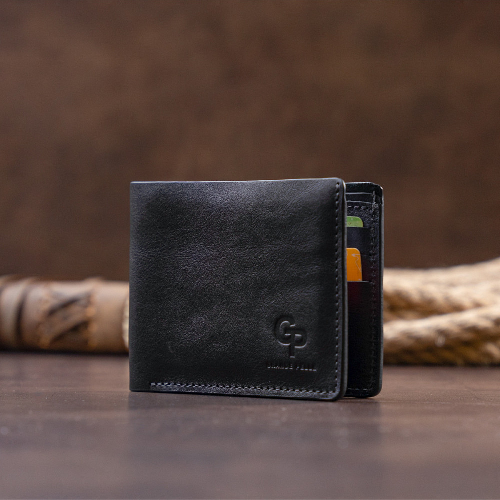 Горизонтальне портмоне в гладкій шкірі без застібки GRANDE PELLE 11311 Чорне Київ - фото 4