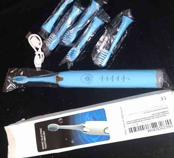 Электрическая зубная щётка + 6 насадок . Харьков