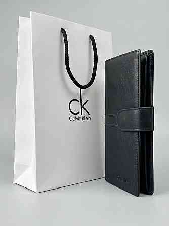 Чоловічий довгий шкіряний гаманець на кнопці Calvin Klein (1342) Київ