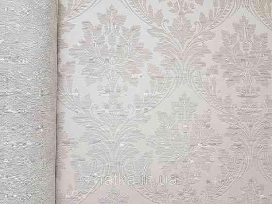 Шпалери вінілові на флізеліні Grandeco Time метрові структурні вензелю завитки бежеві на світло-бежевому Київ