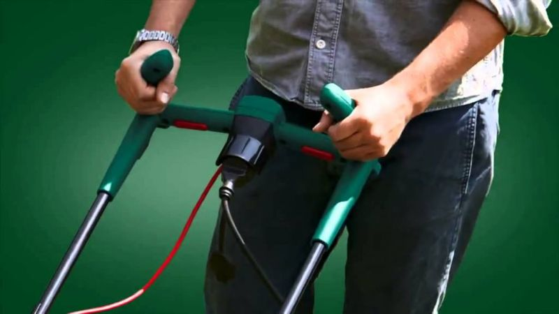 Потужна газонокосарка електрична Bosch ARM 34 : 1300 Вт, ширина захвата 34 см, висота зрізу 20-70 мм Київ - фото 2