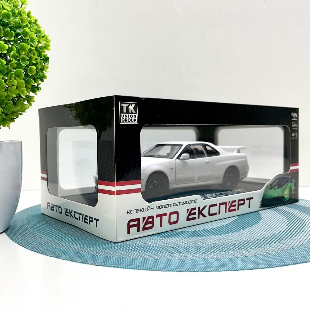Машинка металева Авто Експерт Nissan GT-R 1:24 світло/звук відчиняються двері капот багажник Біла (1990-21) Чернигов - изображение 8