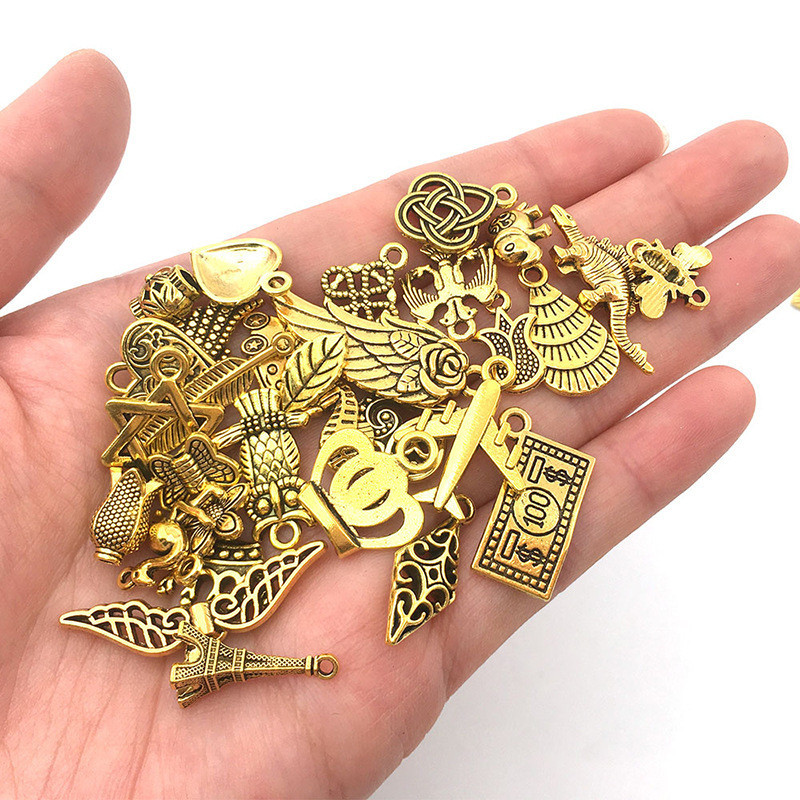 Набір золотих підвісок "Тварини" 50 шт для прикрас Київ - фото 5