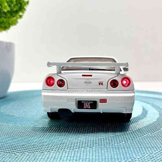 Машинка металева Авто Експерт Nissan GT-R 1:24 світло/звук відчиняються двері капот багажник Біла (1990-21) Чернігів