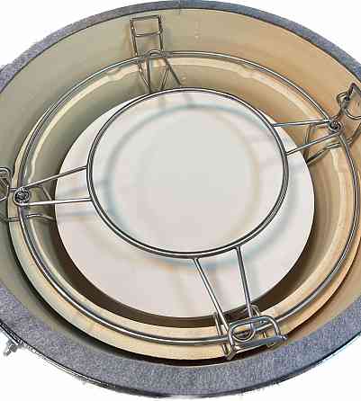 Комплект из камня, чугунной решетки и двухуровневой системы из нержавеющей стали для керамических грилей 47 см GRILLI 006035 Код: Ровно