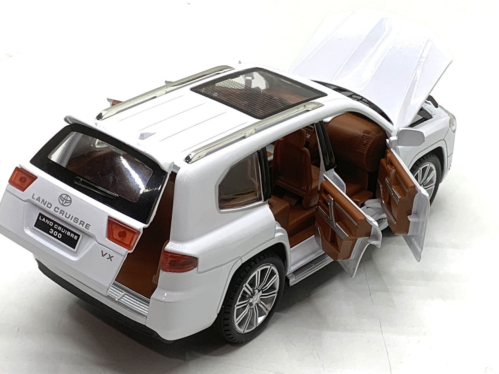 Машина Автосвіт Toyota Land Cruiser 30 інерційна відчиняються двері капот багажник 20см Білий (AP-2033) Чернігів - фото 7