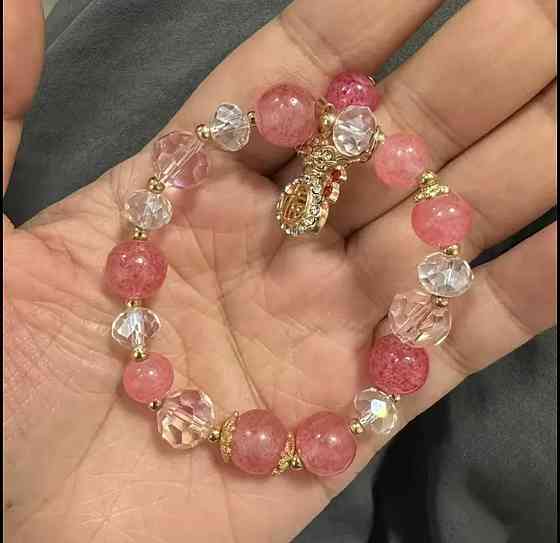 Браслет «Щасливий талісман» з рожевими намистинами та підвіскою Київ