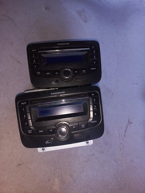 Оригинальное штатное головное устройство (автомагнитола) Geely Emgrand Київ - фото 1